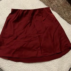 Red wine silk skirt from Forever 21. Never worn. Size small.
